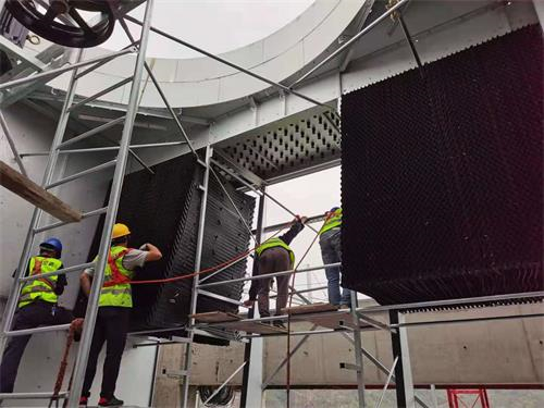 風筒的漂流水對開式冷卻塔的影響